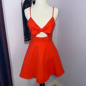 Red Lulu’s mini dress! Cute cutout with bow accent! Worn once. Very comfortable!